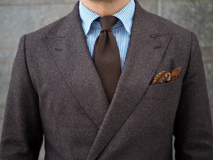 Brown suit with brown accessories