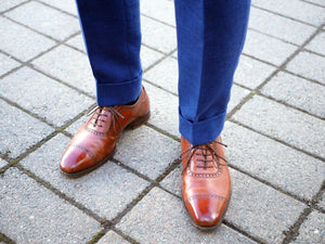 Mid-brown shoes with business suit