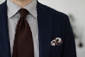 Brown tie with blue blazer